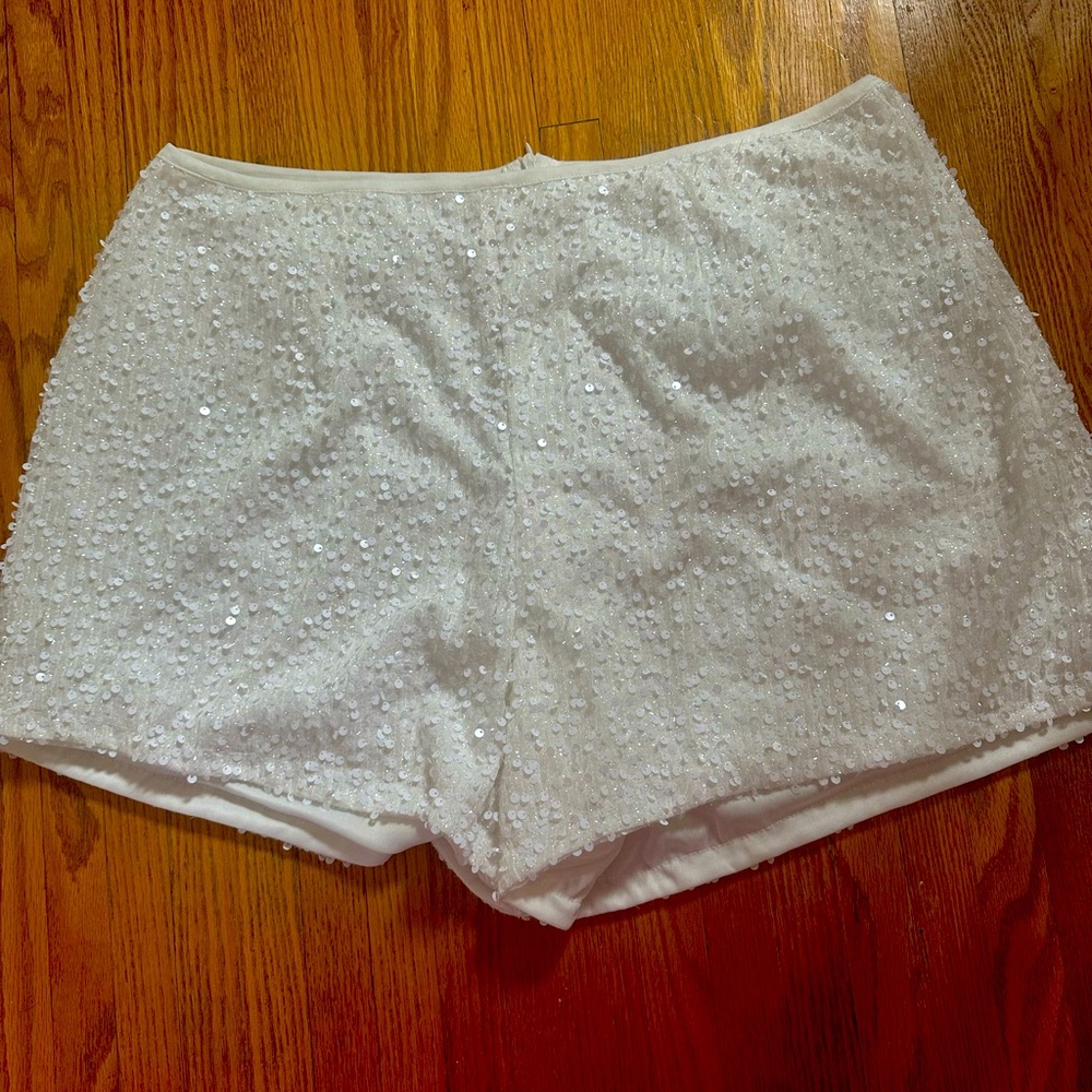 White sequin shorts with zipper